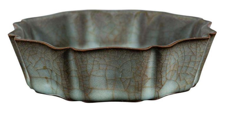 Elegance in Simplicity: Guan Ware Floriform Dish - Celadon Glaze