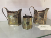 A Pair of George III Silver Milk Jugs and a Silver Christening Cup