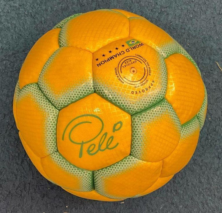 A Yellow and Green Café Pelé Football Owned by Pelé