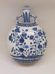 A Ming Dynasty Chinese porcelain blue and white lotus moon vase