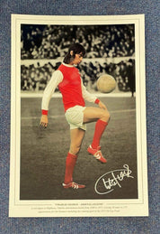 Charlie George Autographed 18x12 Photo - Iconic Moment in Arsenal History