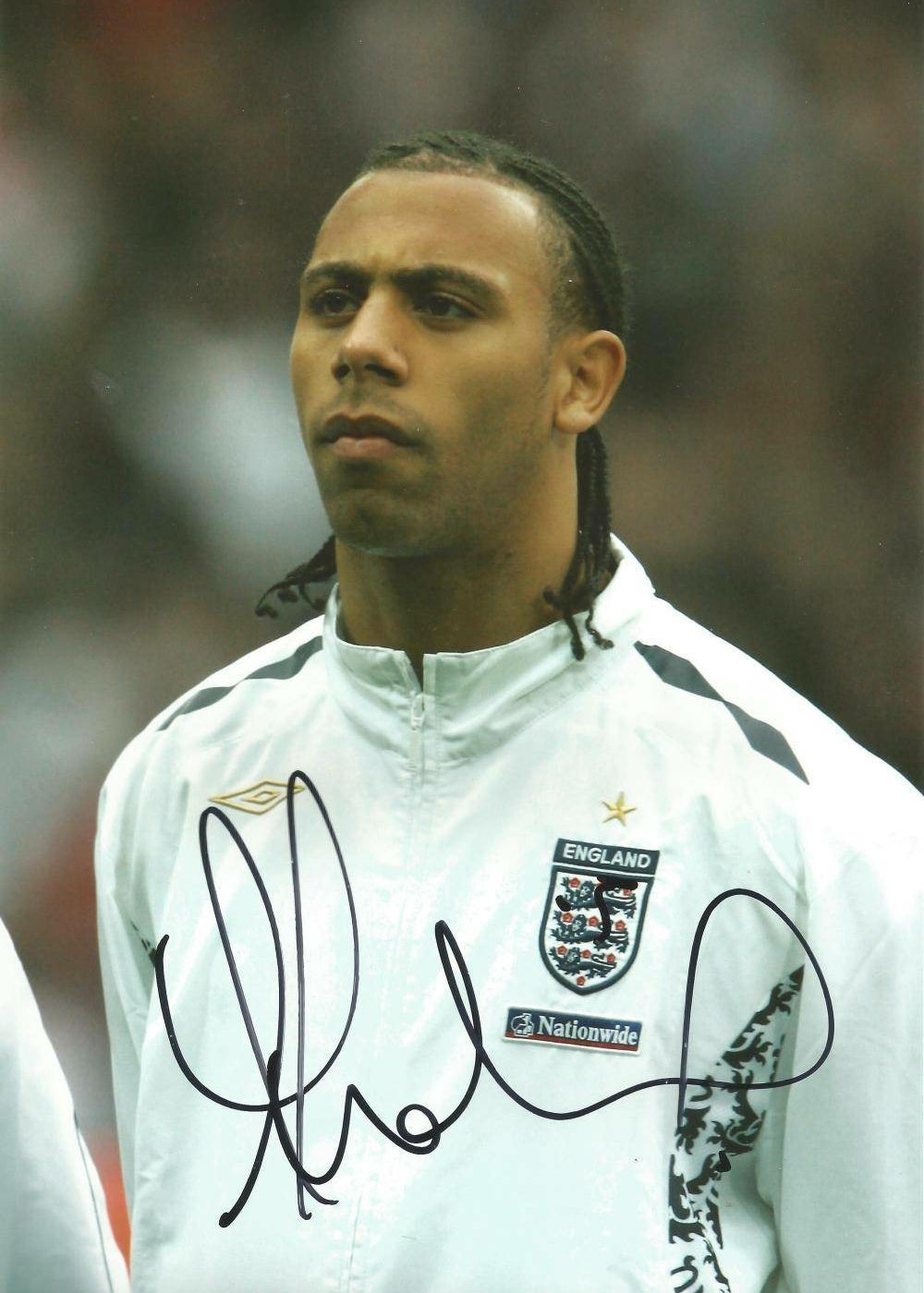 Football Memorabilia - Autographed 12x8 Photo by Anton Ferdinand for England