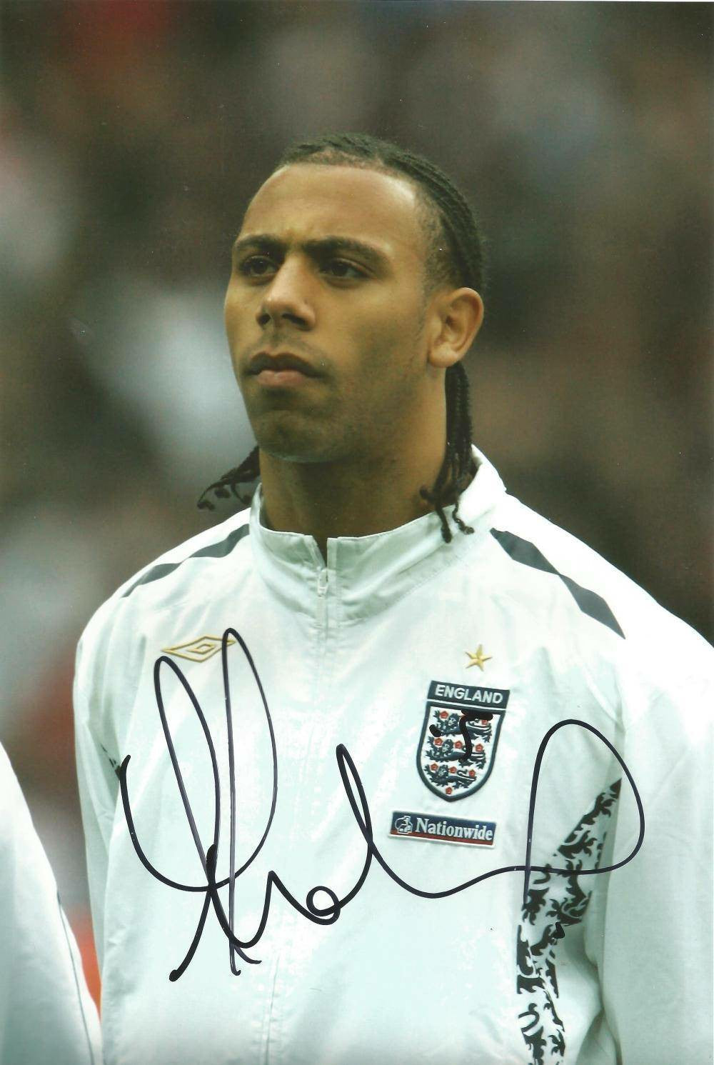 Football Memorabilia - Autographed 12x8 Photo by Anton Ferdinand for England