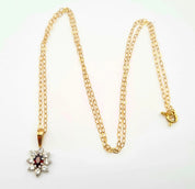 Captivating 9K Gold Disappearing Necklace, White & Red Gemstone Pendant