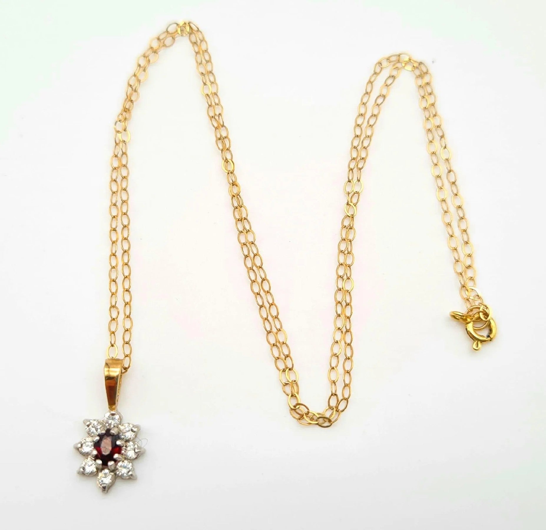 Captivating 9K Gold Disappearing Necklace, White & Red Gemstone Pendant