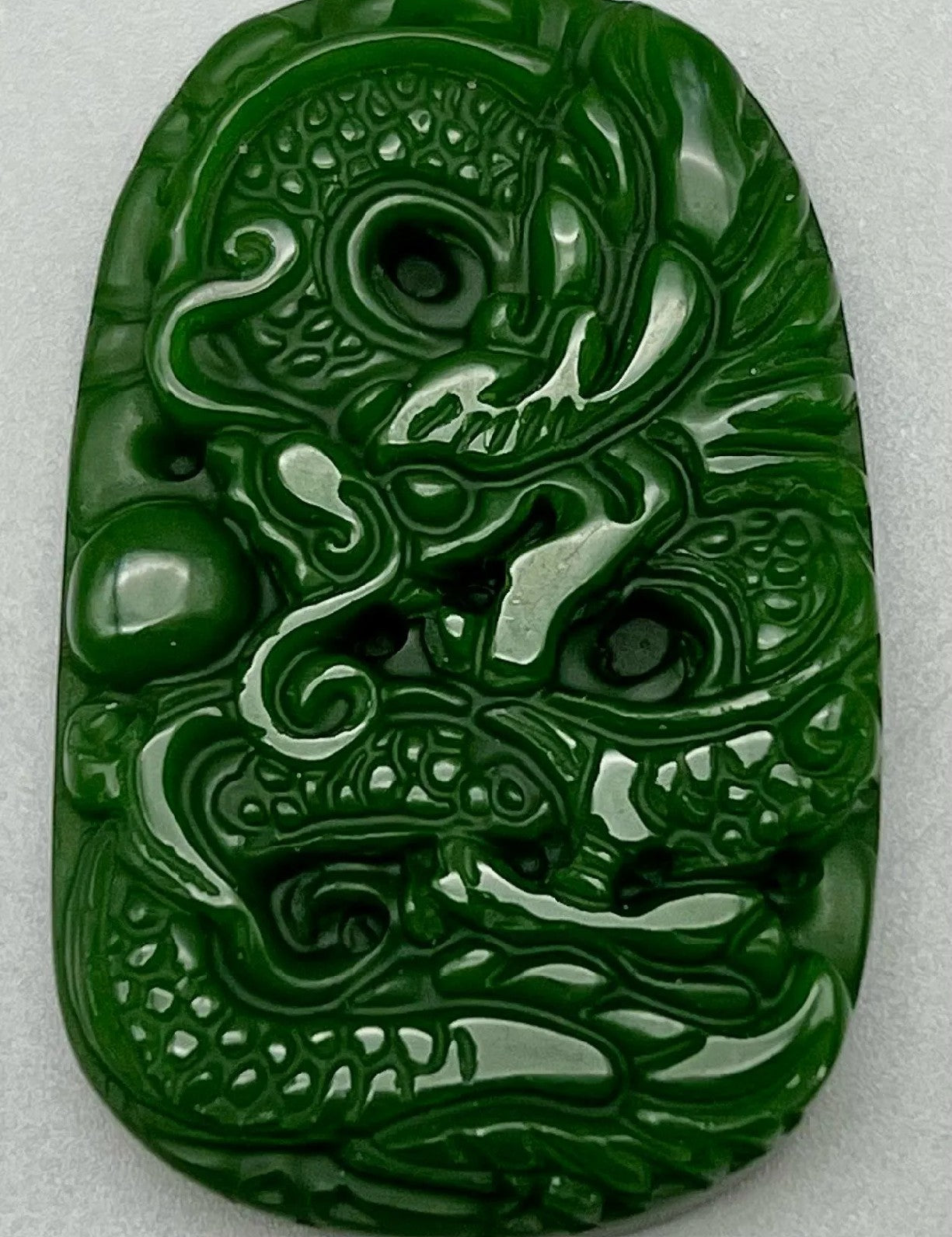 Carved Dragon Design Green Jade Pendant 1.38 x 1.97 inches