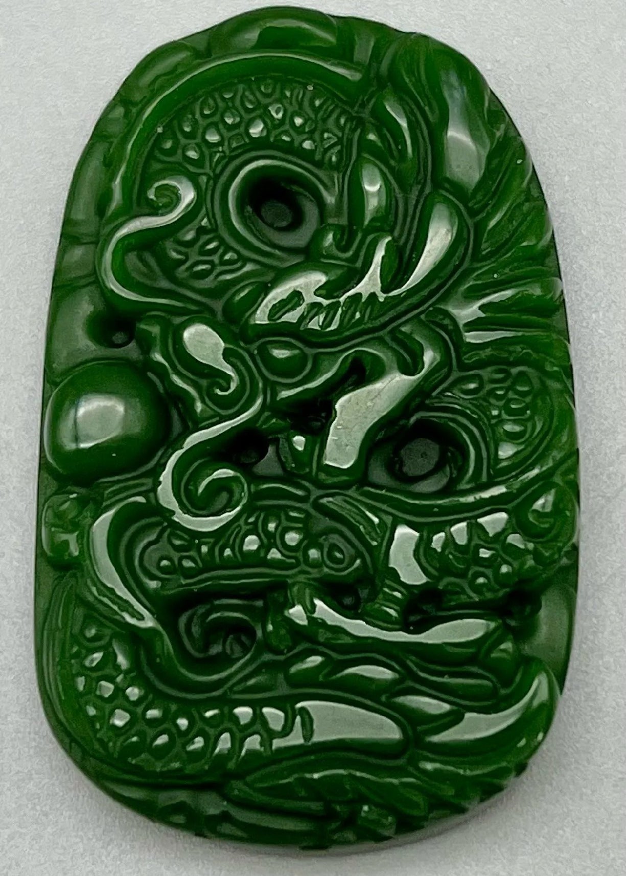 Carved Dragon Design Green Jade Pendant 1.38 x 1.97 inches