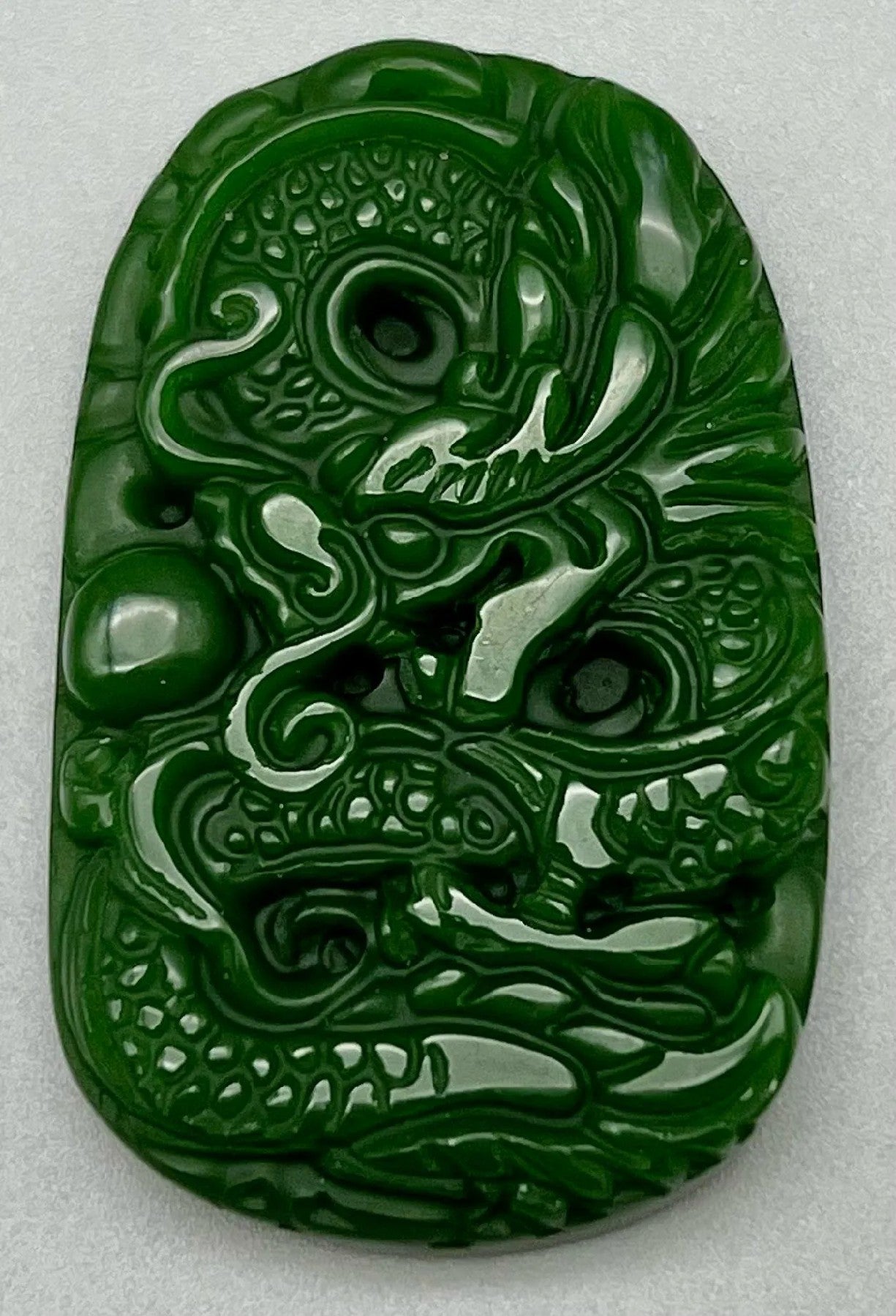 Carved Dragon Design Green Jade Pendant 1.38 x 1.97 inches