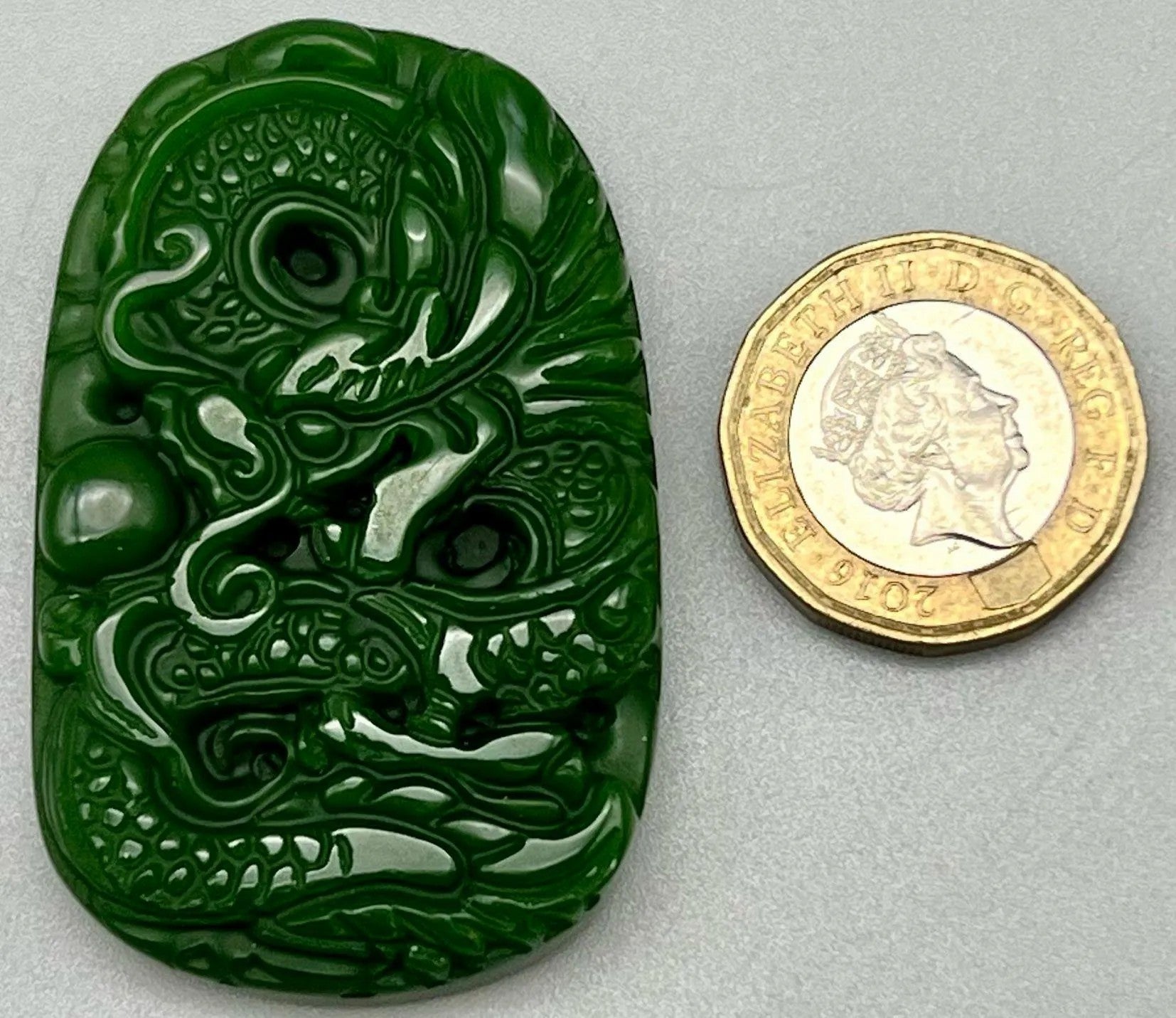 Carved Dragon Design Green Jade Pendant 1.38 x 1.97 inches