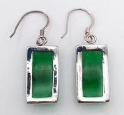 Pair of Emerald-Adorned Sterling Silver Oriental Earrings