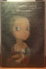 Woman Holding a Ferret