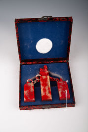 Three Chinese Jixue Blood Stone Seals Linked by Chain in Original Box