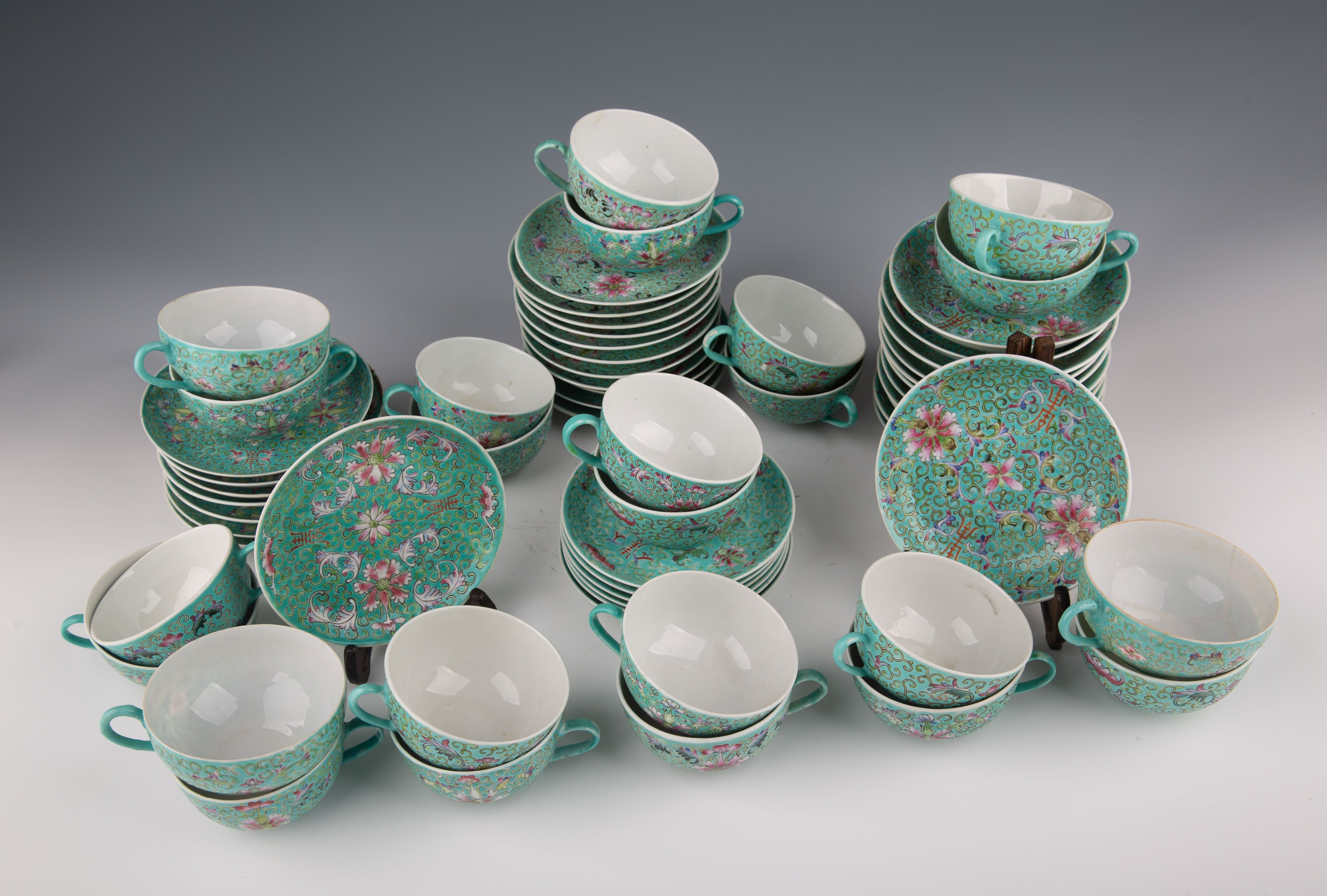 A set of Chinese pink porcelain tea sets: 24 cups and 37 saucers