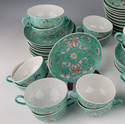 A set of Chinese pink porcelain tea sets: 24 cups and 37 saucers