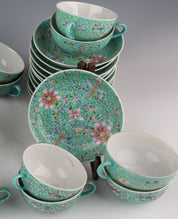 A set of Chinese pink porcelain tea sets: 24 cups and 37 saucers