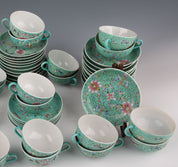 A set of Chinese pink porcelain tea sets: 24 cups and 37 saucers