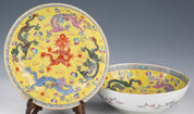 A pair of Chinese porcelain dragon bowls