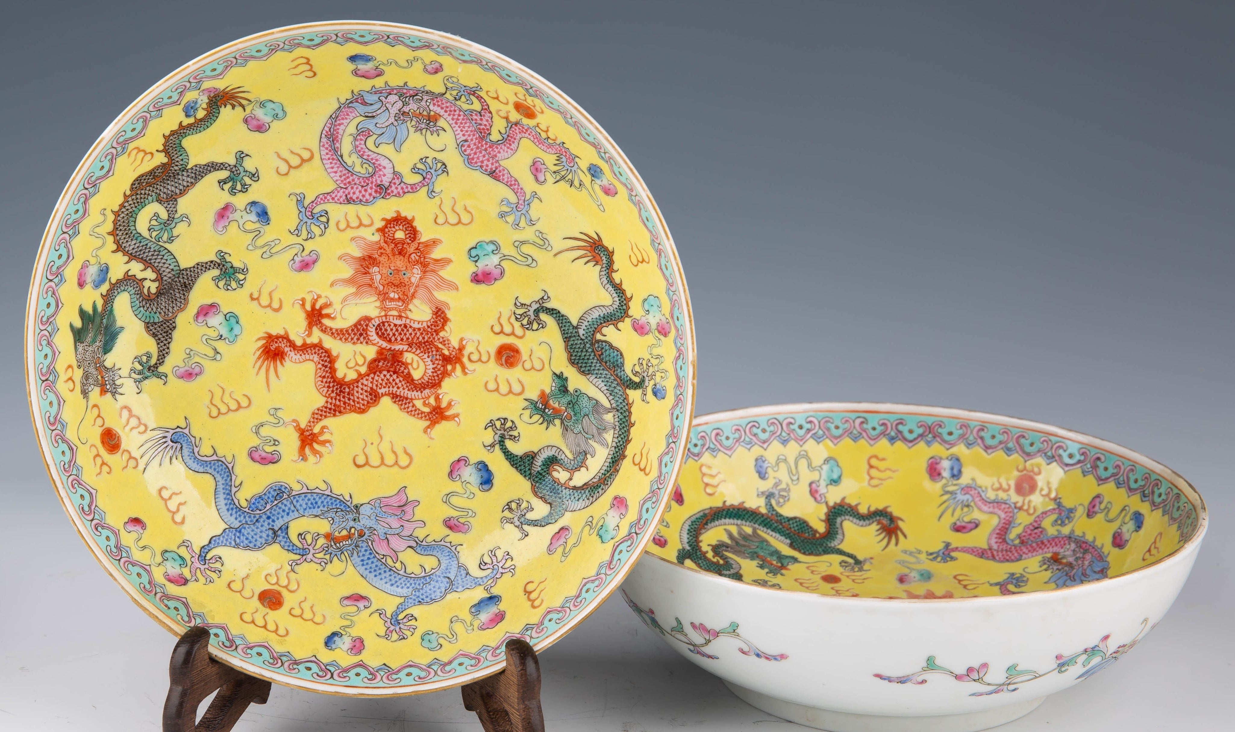 A pair of Chinese porcelain dragon bowls