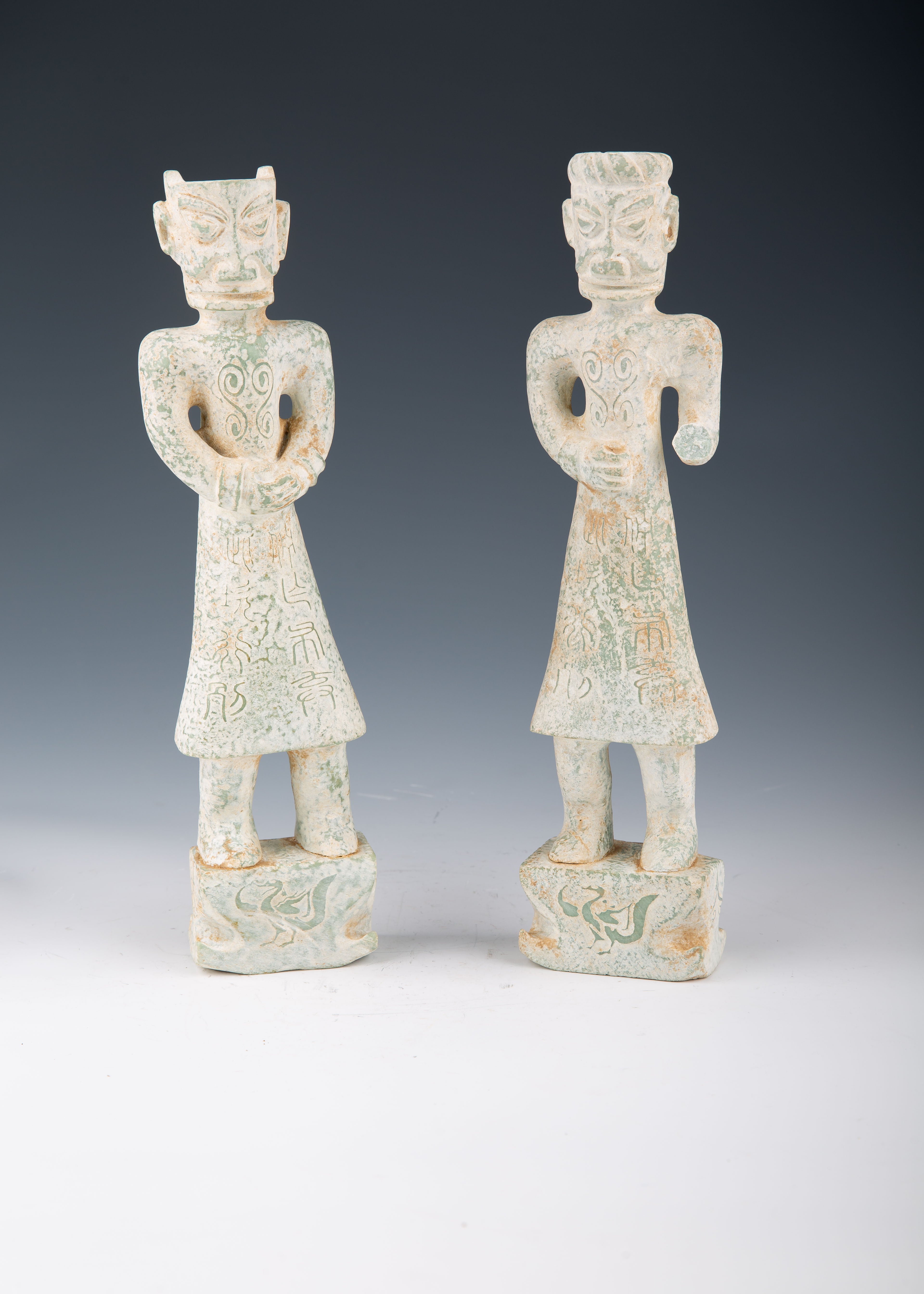 Pair of Chinese Sanxingdui-Style Hard Stone Figurines