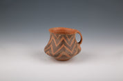 Clay Vessel with Ochre and Brown Geometric Decorations