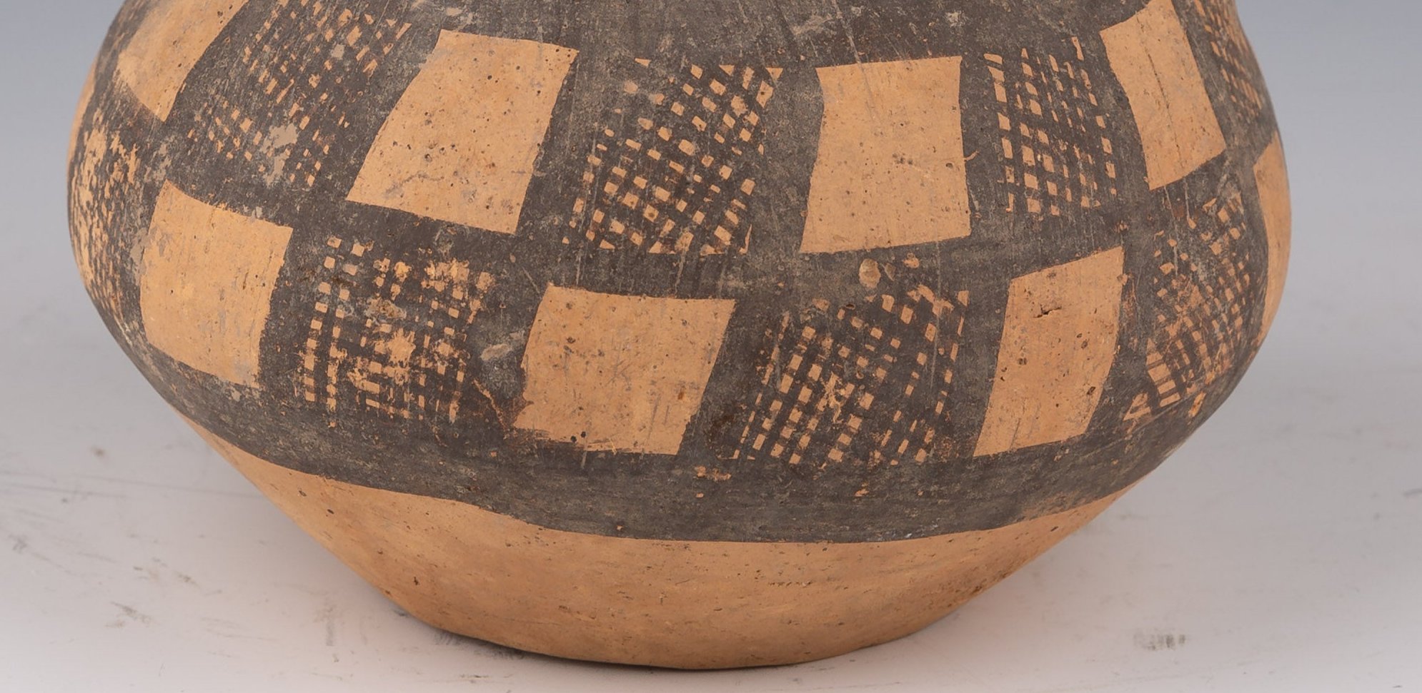 Clay with Ochre and Brown Geometric Decorations in the New Stone Age