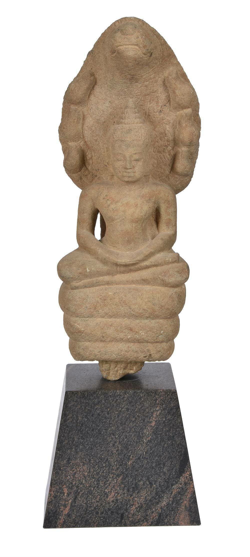 A Khmer Sandstone Figure of Buddha Sheltered by the Seven-Headed Cobra Mucalinda