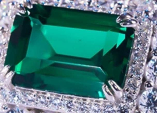 Emerald, Diamond, and Eighteen Karat Gold Ring