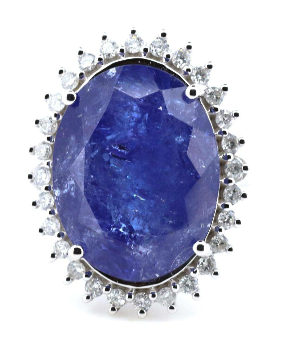 14ct White Gold Tanzanite and Diamond Halo Ring