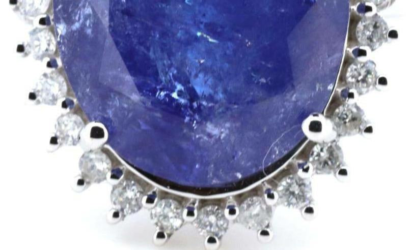 14ct White Gold Tanzanite and Diamond Halo Ring