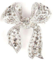 Collection of Four Vintage Diamond Bow Brooches