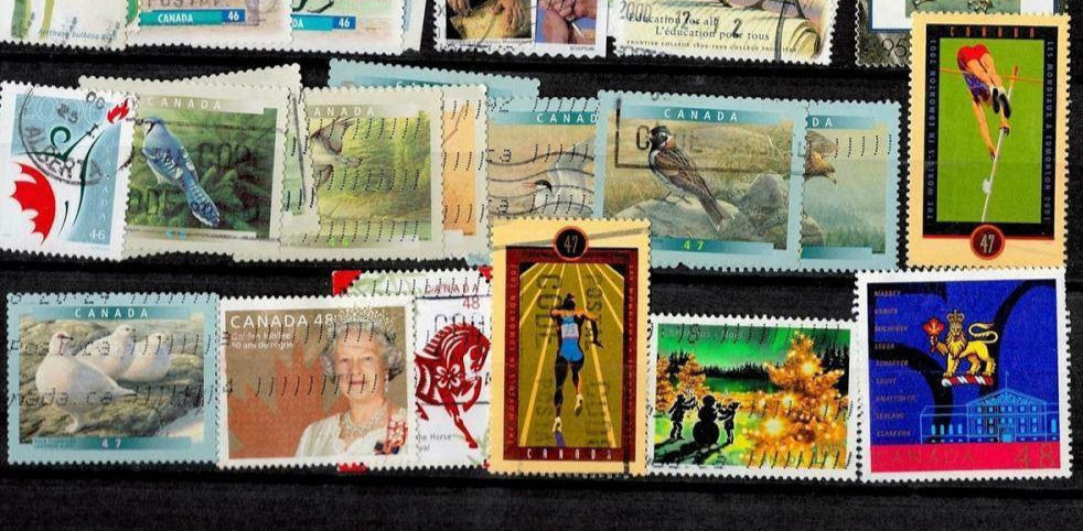 Canada Used Stamps on Hardcover Hinged Photo Album Page