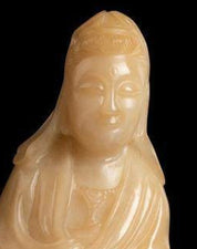 Pale Yellow Soapstone Carving of a Seated Guanyin