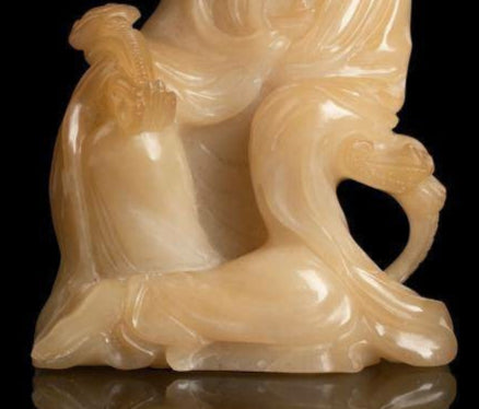 Pale Yellow Soapstone Carving of a Seated Guanyin