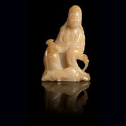 Pale Yellow Soapstone Carving of a Seated Guanyin