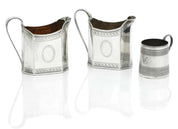 A Pair of George III Silver Milk Jugs and a Silver Christening Cup