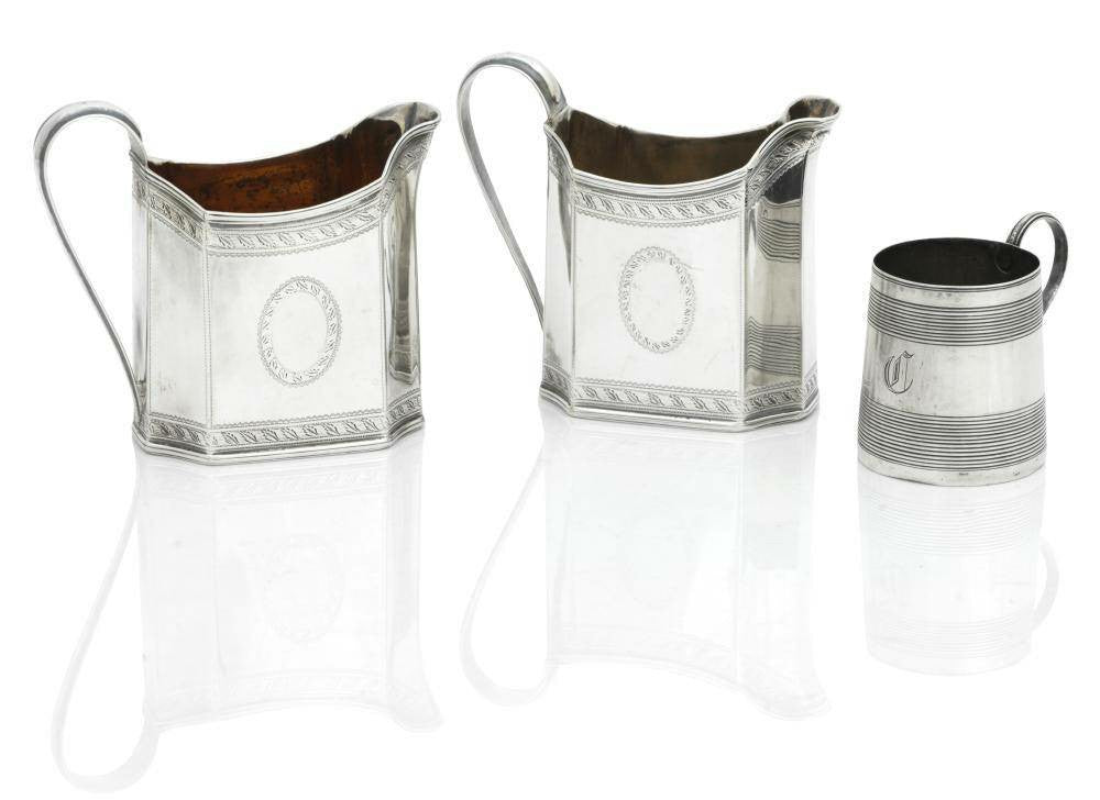 A Pair of George III Silver Milk Jugs and a Silver Christening Cup