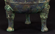 A Bronze Ritual Tripod Vessel and Cover (Ding)
