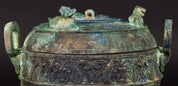 A Bronze Ritual Tripod Vessel and Cover (Ding)
