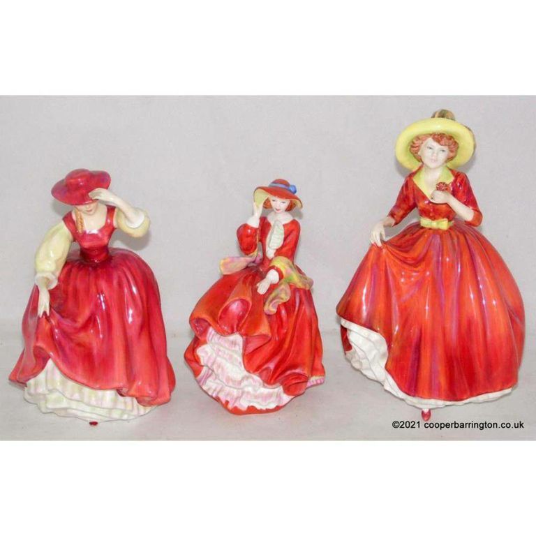 Elegance in Trio: Royal Doulton Ceramic Figurines